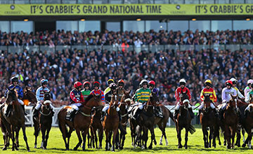 LIVERPOOL, ENGLAND - APRIL 11: Shutthefrontdoor ridden by Tony McCoy waits with other horses and riders to start the 2015 Crabbie's Grand National at Aintree Racecourse on April 11, 2015 in Liverpool, England. (Photo by Alex Livesey/Getty Images)